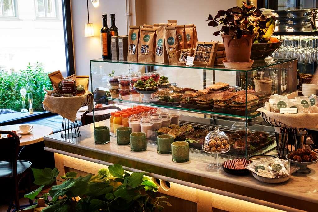 Villa Dagmar Στοκχόλμη Εστιατόριο φωτογραφία A display of coffee and pastries at a café in Stockholm, Sweden